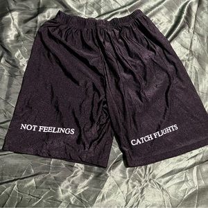 black loose shorts “catch flights not feelings”